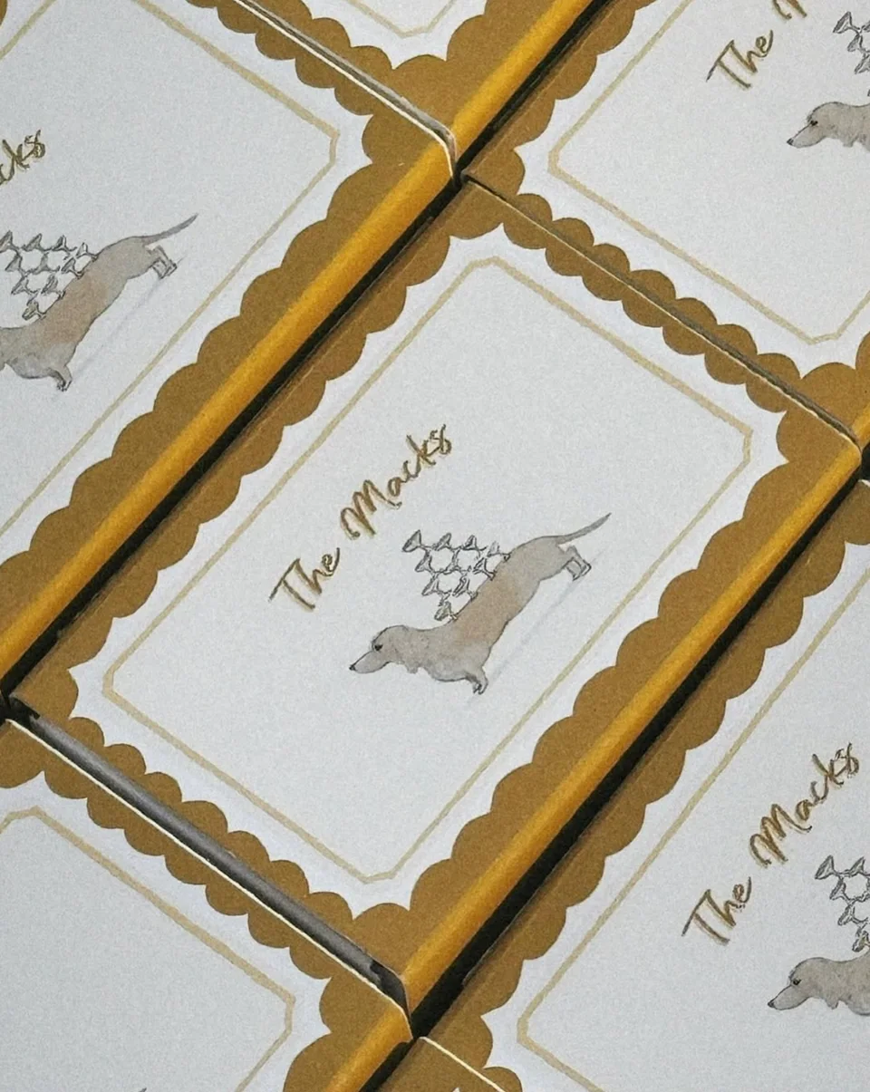 Mustard scalloped matchboxes with a dachshund